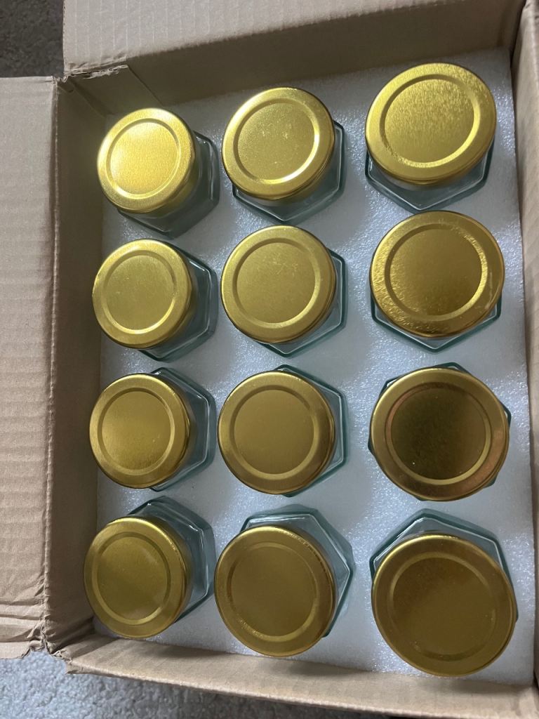 Set of 12 unused 4oz hexagonal preserve jars. 