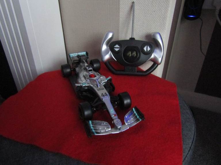 A LEWIS HAMILTON F1 MERCEDES RADIO CONTROL RACING CAR. WORKS GREAT!
