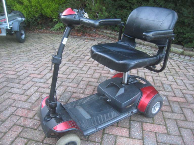 image for Go Go Elite traveller mobility scooter with charger and two keys. 