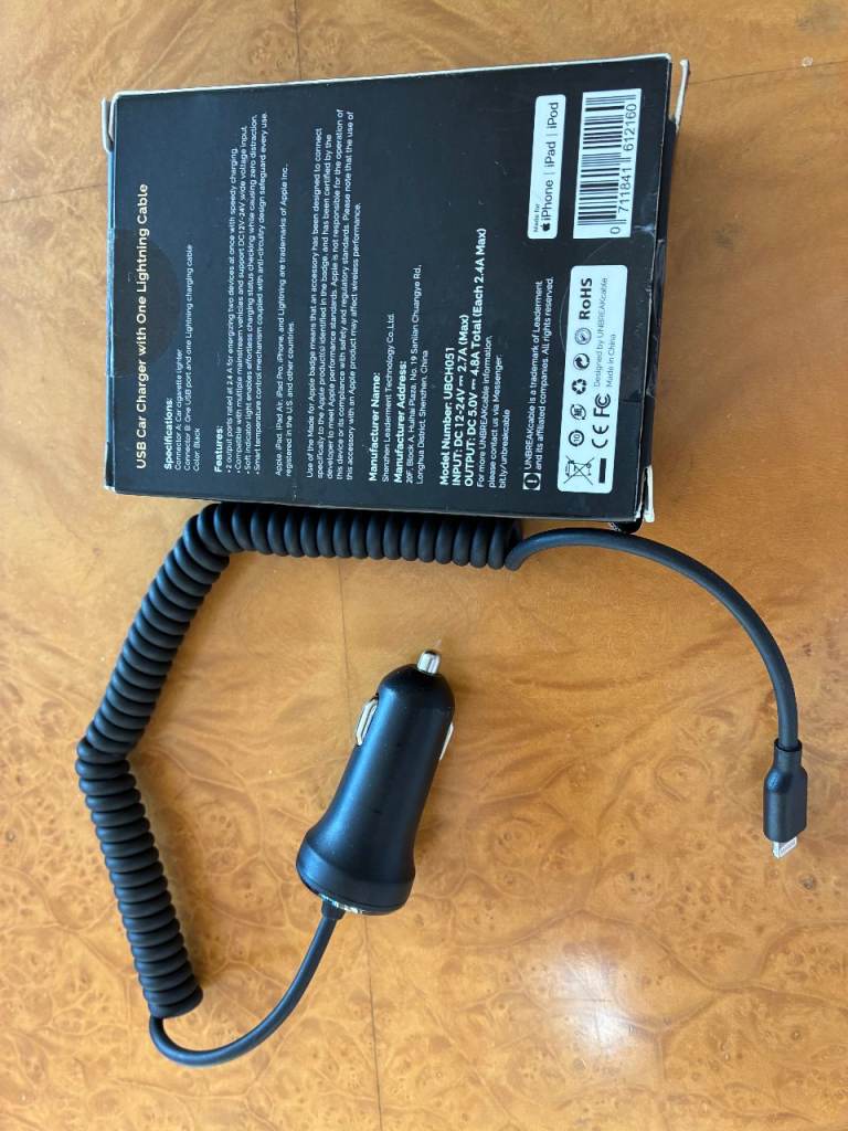 New - Iphone USB car charger with one lightning cable. Can be used for any iPhone from 5 - 14