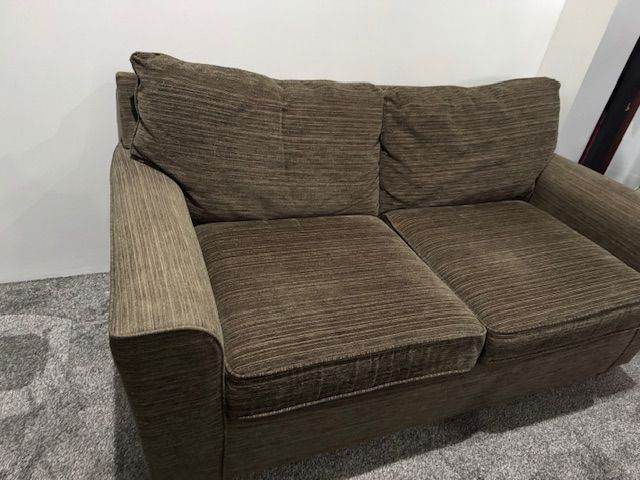 Brown double sofa bed with mattress