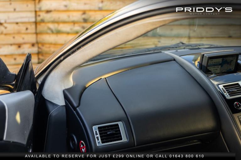 ASTON MARTIN DB9 5.9 - 13 Stamp service portfolio - Future classic by Aston