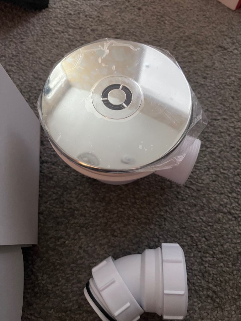 Chrome shower waste trap