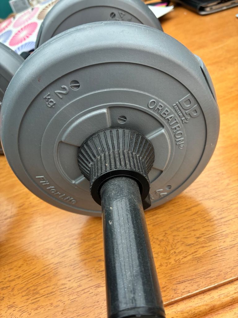 Two hand held dumb bells