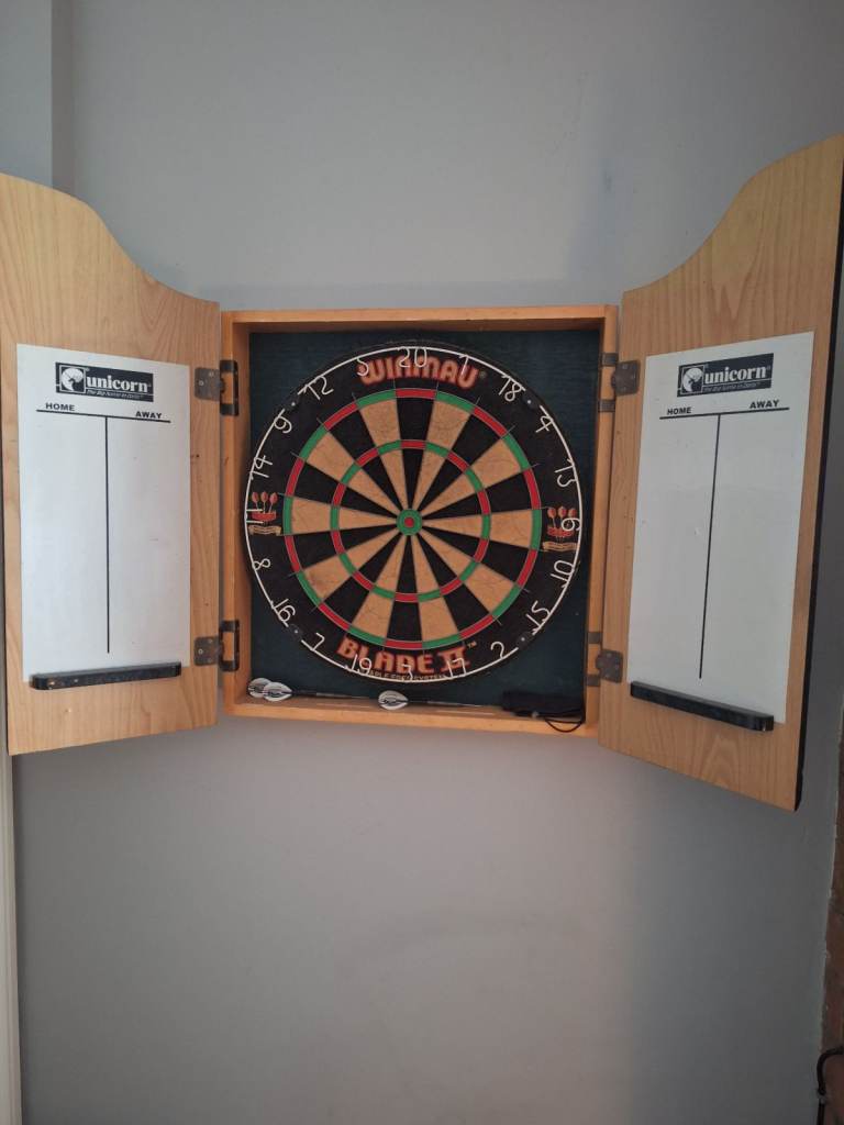 Winmau dart board and cabinet 