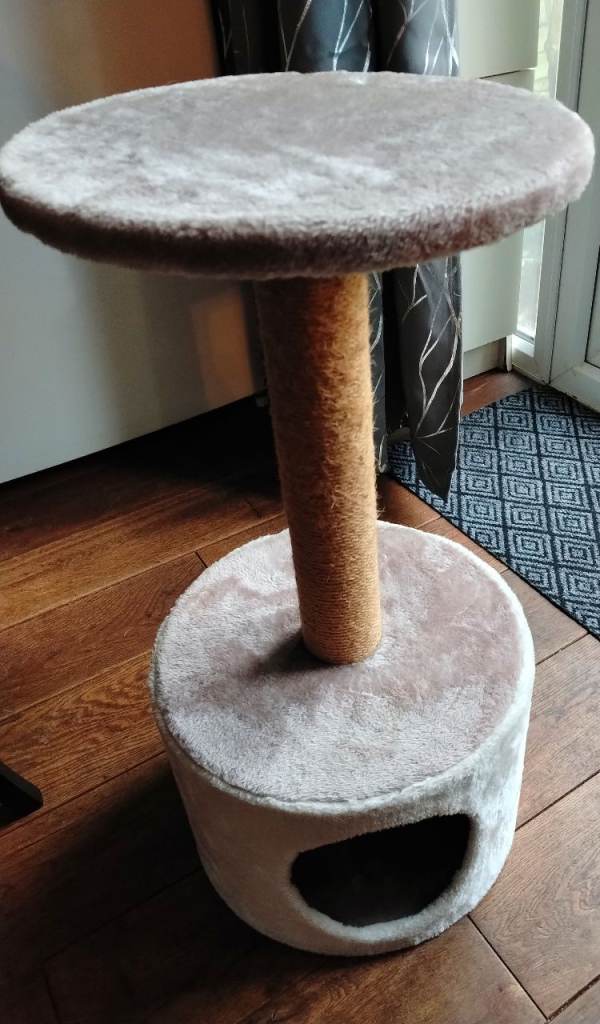 Pet scratcher and sleeping section