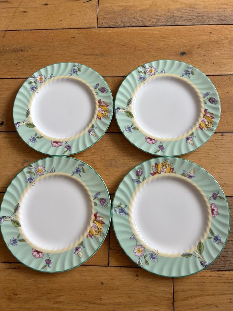 Four excellent Minton side plates 