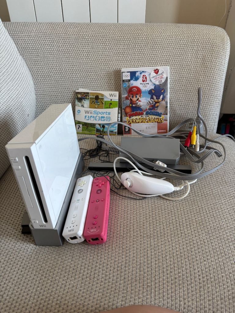 Nintendo Wii Console Bundle with Wii Fit Board and Games