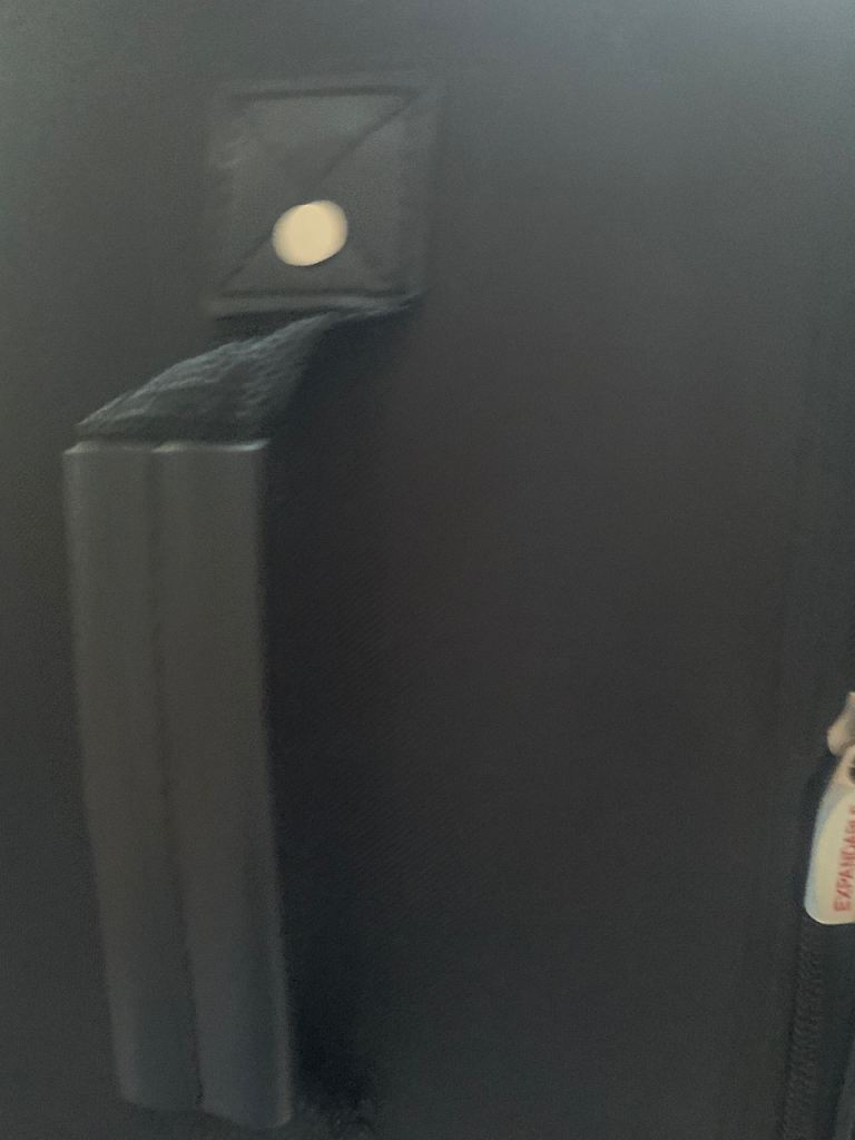 LARGE BLACK/BURGUNDY SUITCASE ON 2  WHEELS