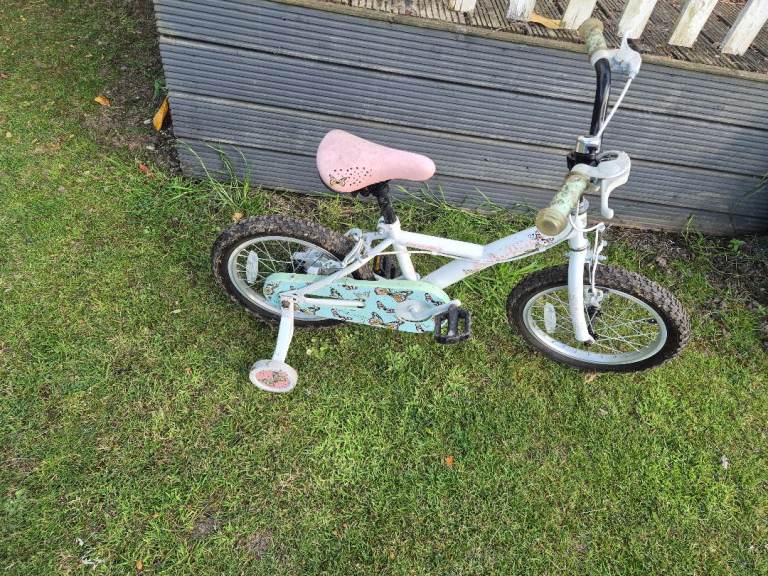 Girls first bike with stabilisers 