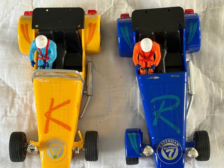 Mixed 60-s Figure 8 and 1980's sets with Caterhams and various accessories and track 