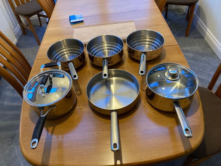 Collection of stainless steel cook ware