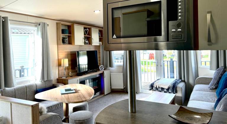 Own a caravan, repaying monthly, near Gt Yarmouth and Lowestoft