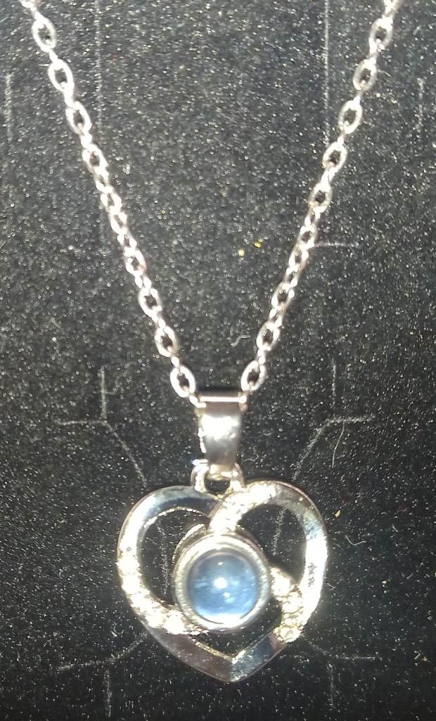 Bundle of 3 silver necklaces with pendants 