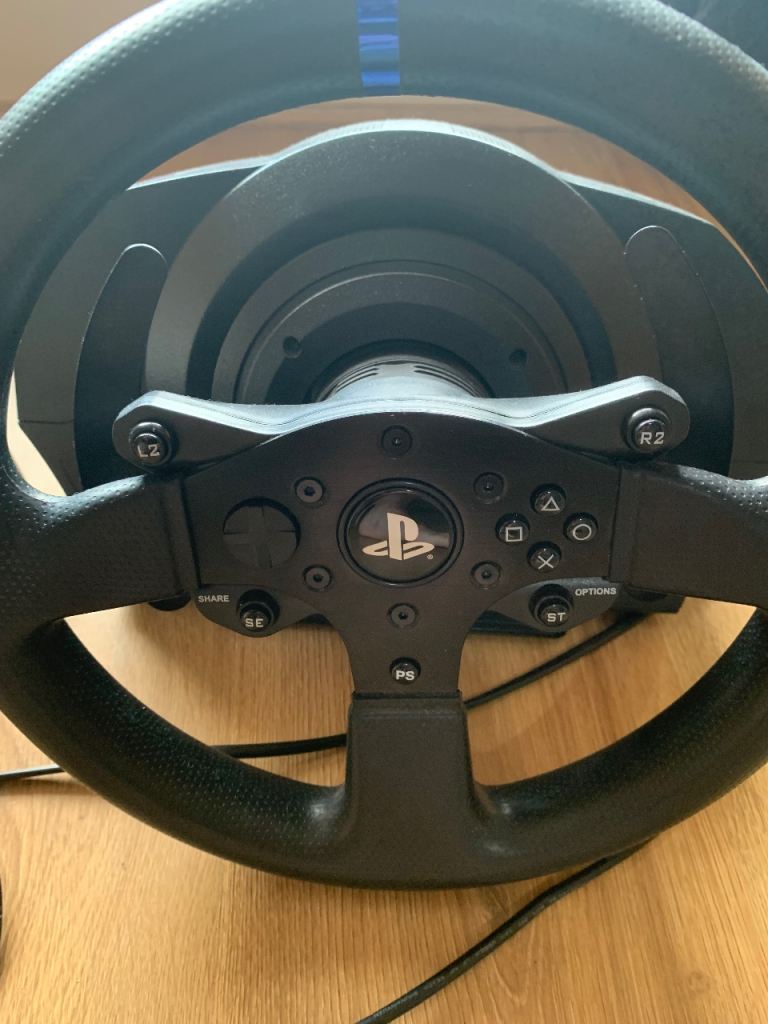 PS4/PS5 Thrustmaster Racing wheel like new ( can deliver for free )