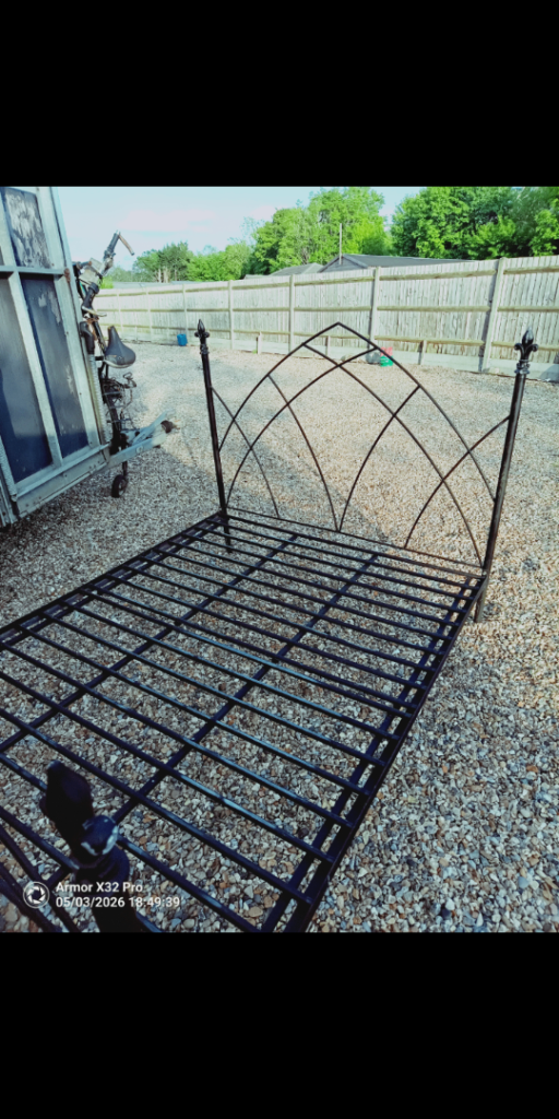 Black cast iron gothic double bed