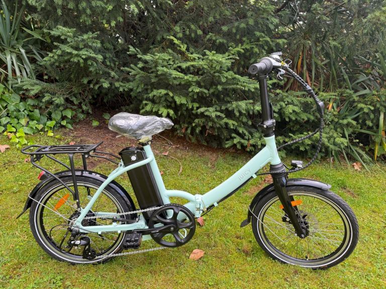 JUICY EBIKE COMPACT PLUS LOW STEP FOLDING. Like New, Large battery capacity.