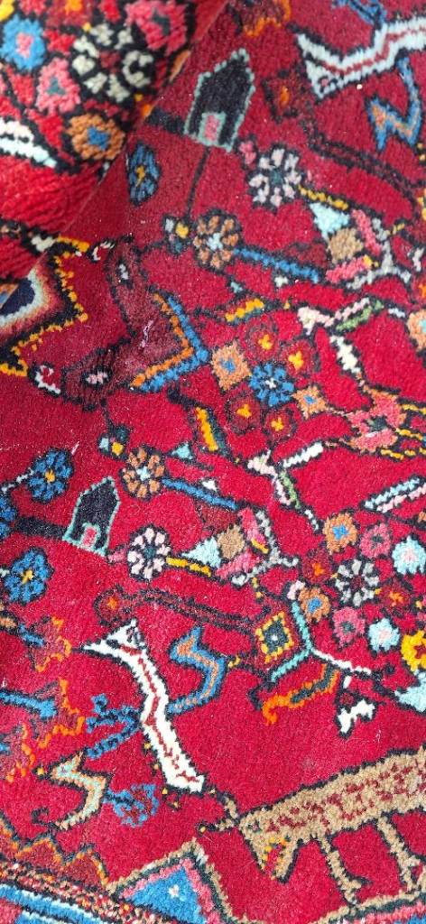 This is a traditional wool rug,i think handmade, 