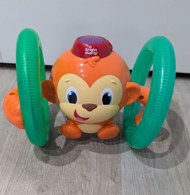 Bright starts roll & glow monkey toy