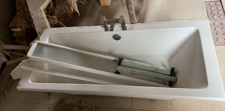 Bath, shower screen, taps and bath panel
