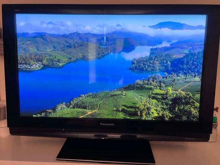 Panasonic 50” TV with stand and remote