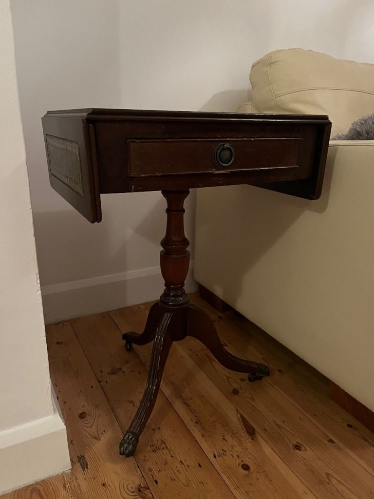 Small drop down sides side table on castors, occasional table