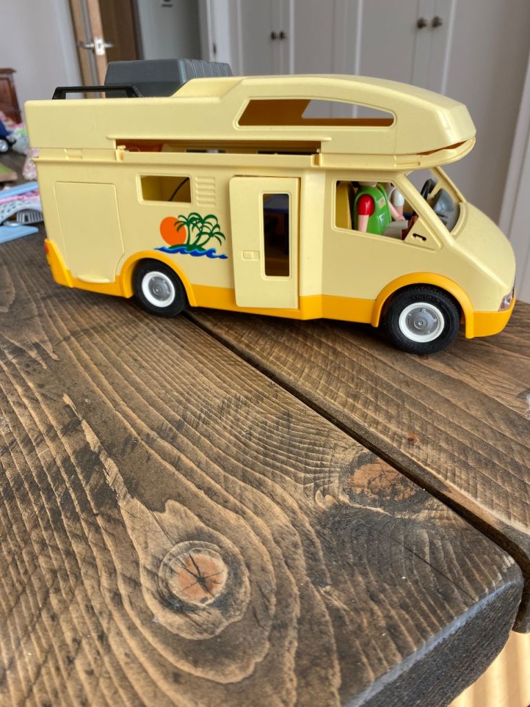 Play mobile camper van and figures.