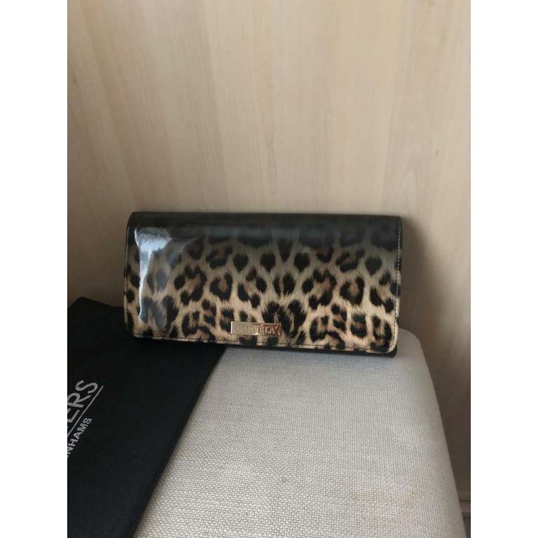 Carvela animal print clutch bag with strap.
