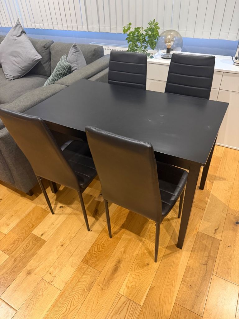 Black Dining Table and Four Chairs