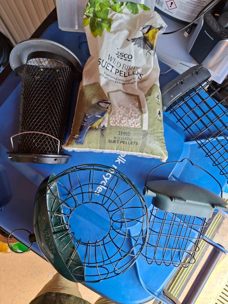 Various bird feeders for suet balls, squares and pellets
