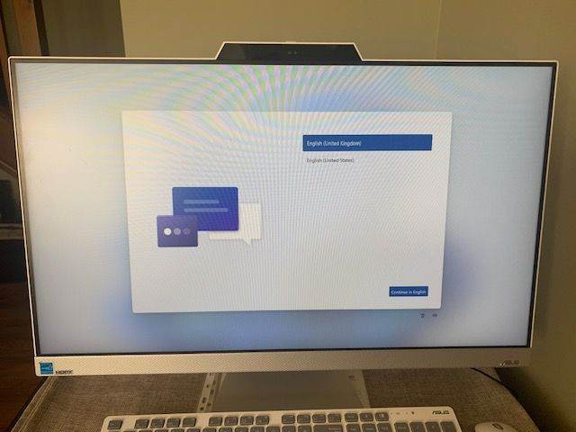 All-in-one desktop PC. 27 inch monitor. Silver and white