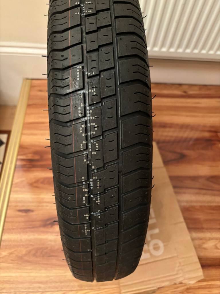 New tyre T125/80 R17 for MG Volvo Fiat etc + new jack; wheel brace wrench. As-new carpets