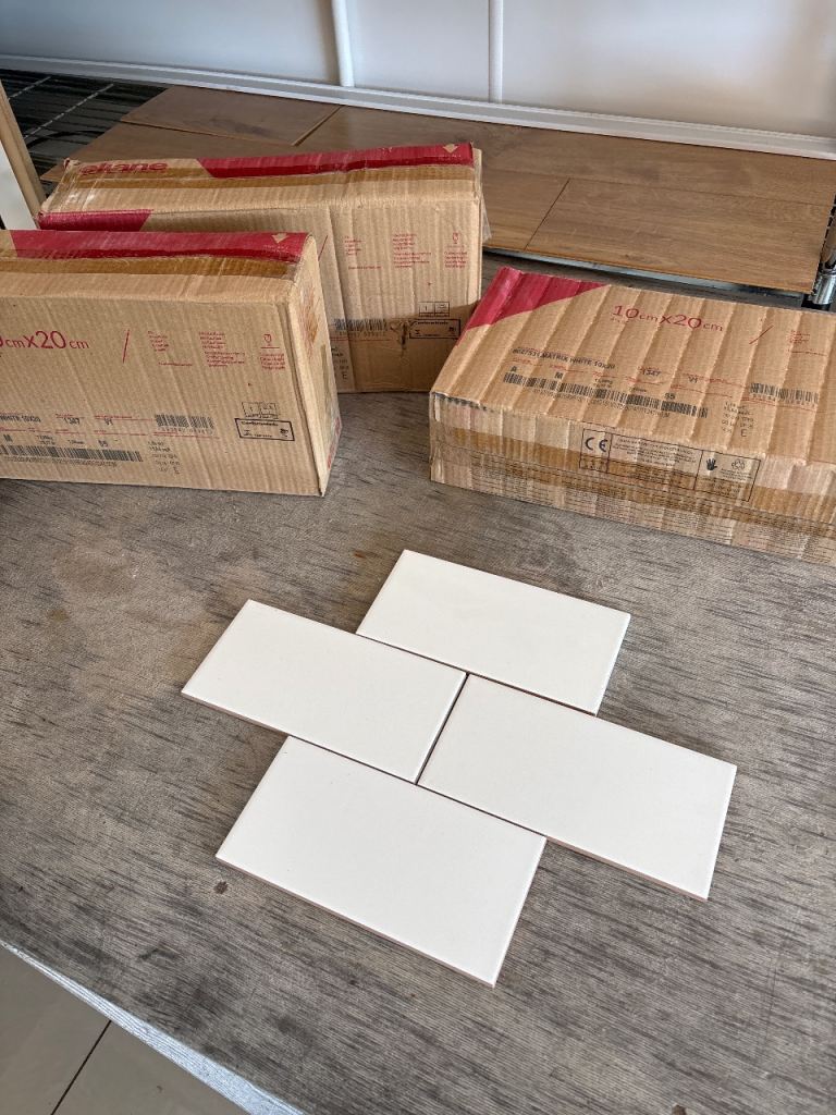White wall tiles, 200x100mm. 3 boxes, 1.1m2 per box.
