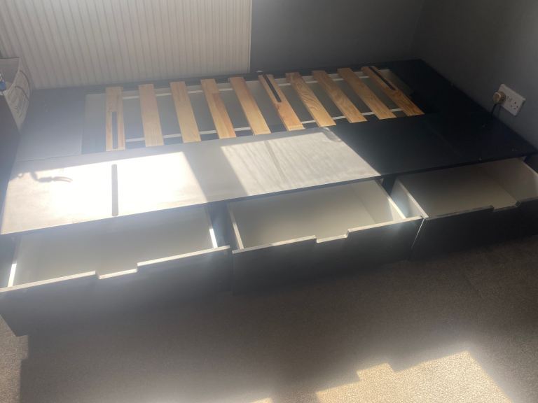 Ikea single black wooden bed with mattress