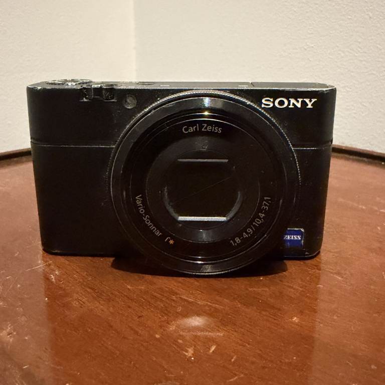 Sony RX100 DSC-RX100 20.2MP Camera with Battery Charger & 8GB SD Card