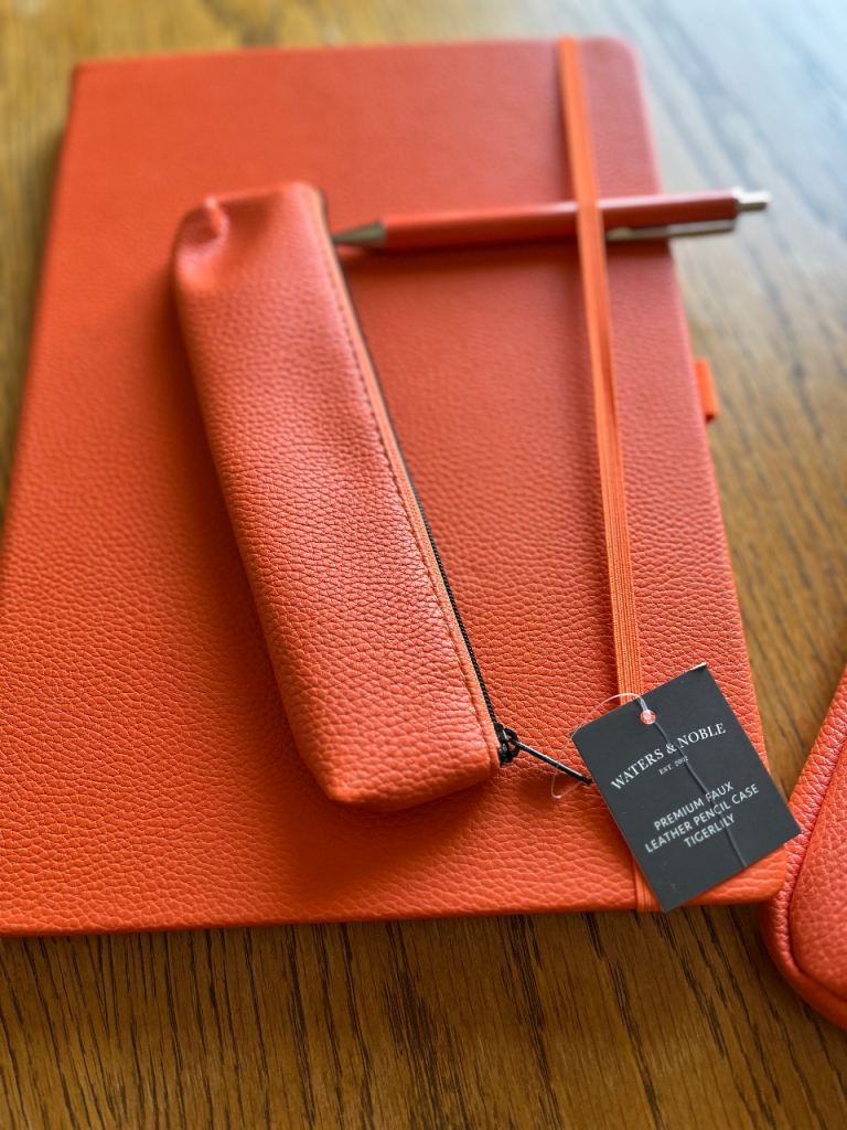 Laptop case, large notepad, pen and pen case