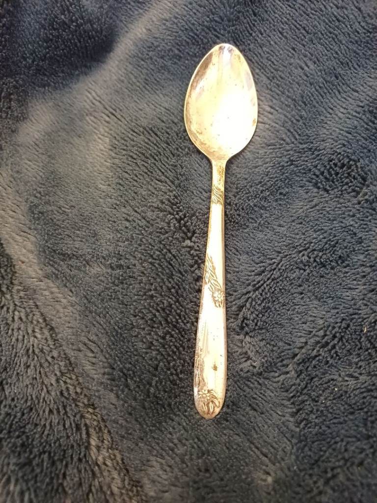 This really pretty Angora Silver plated spoon was Made in England.