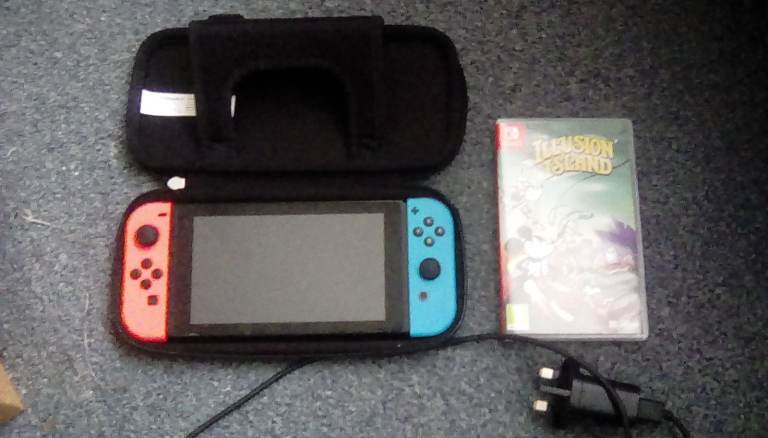 Nintendo Switch with Neon Joy-Cons, Illusion of Gaia, and Carry Case