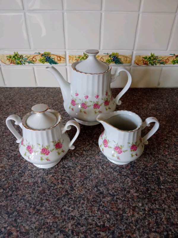 Tea pot plus sugar bowl and milk jug very good condition