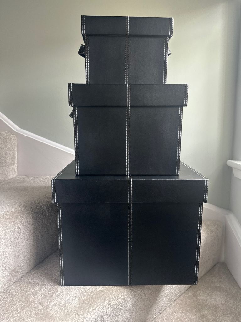 Three faux Leather storage boxes 