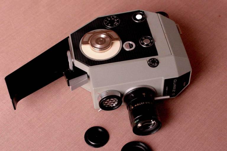 Quartz wind-up standard 8 cine camera with custom accessories