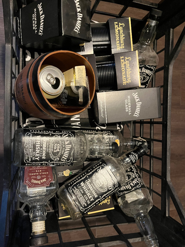 Job lot of Jack daniels bottles, boxes and collectibles 