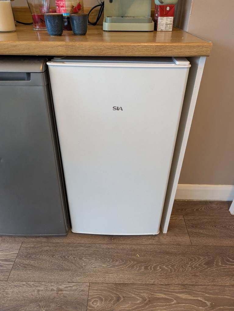 Undercounter fridge with small freezer compartment 