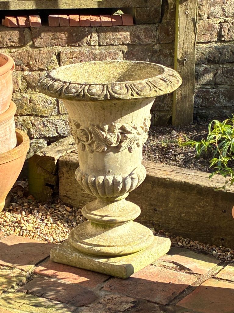 Pair of stone garden urns 