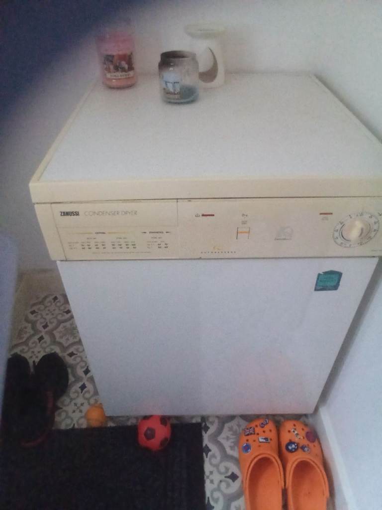 Broken tumble dryer.
