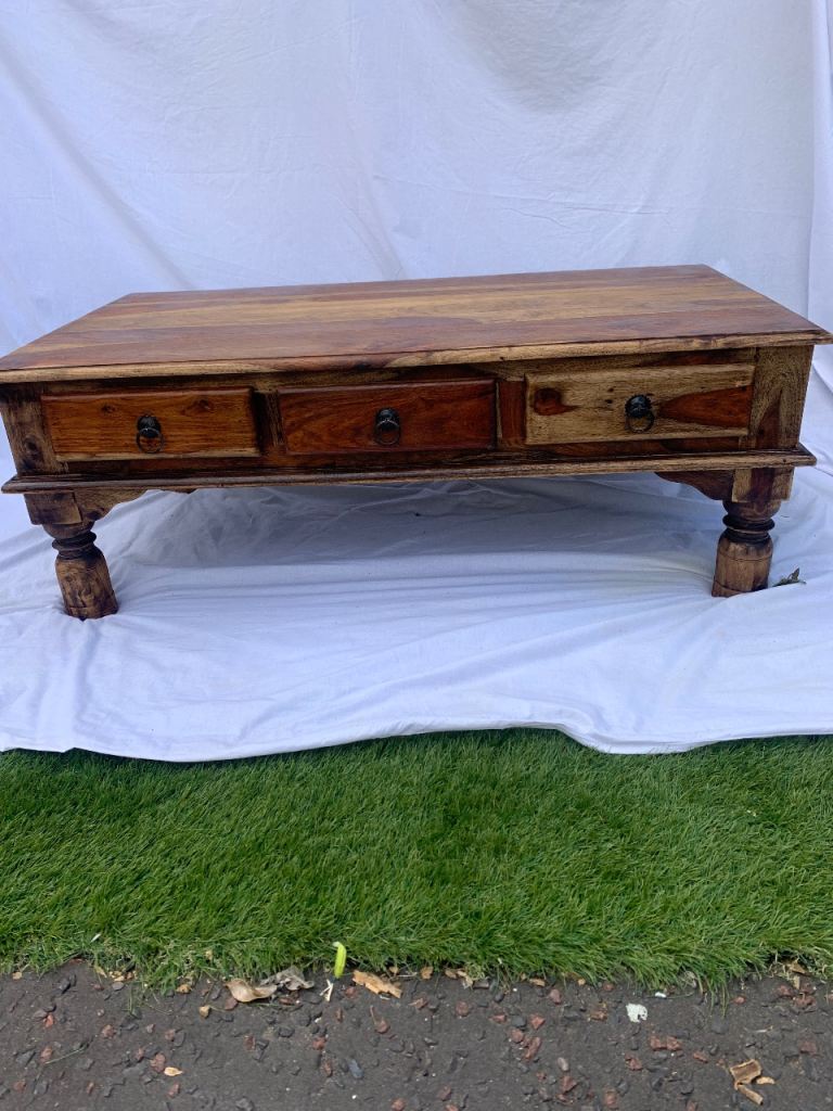 Coffee table with 6 drawersl