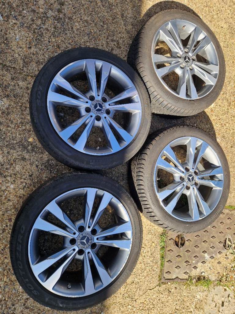 4x 18" Mercedes C Class alloy wheels (5x112) with 225/45R18 winter tyres