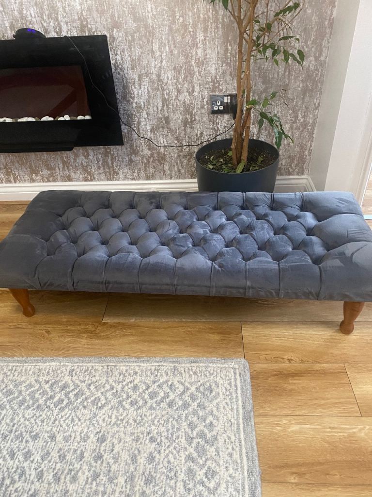 Grey footstool