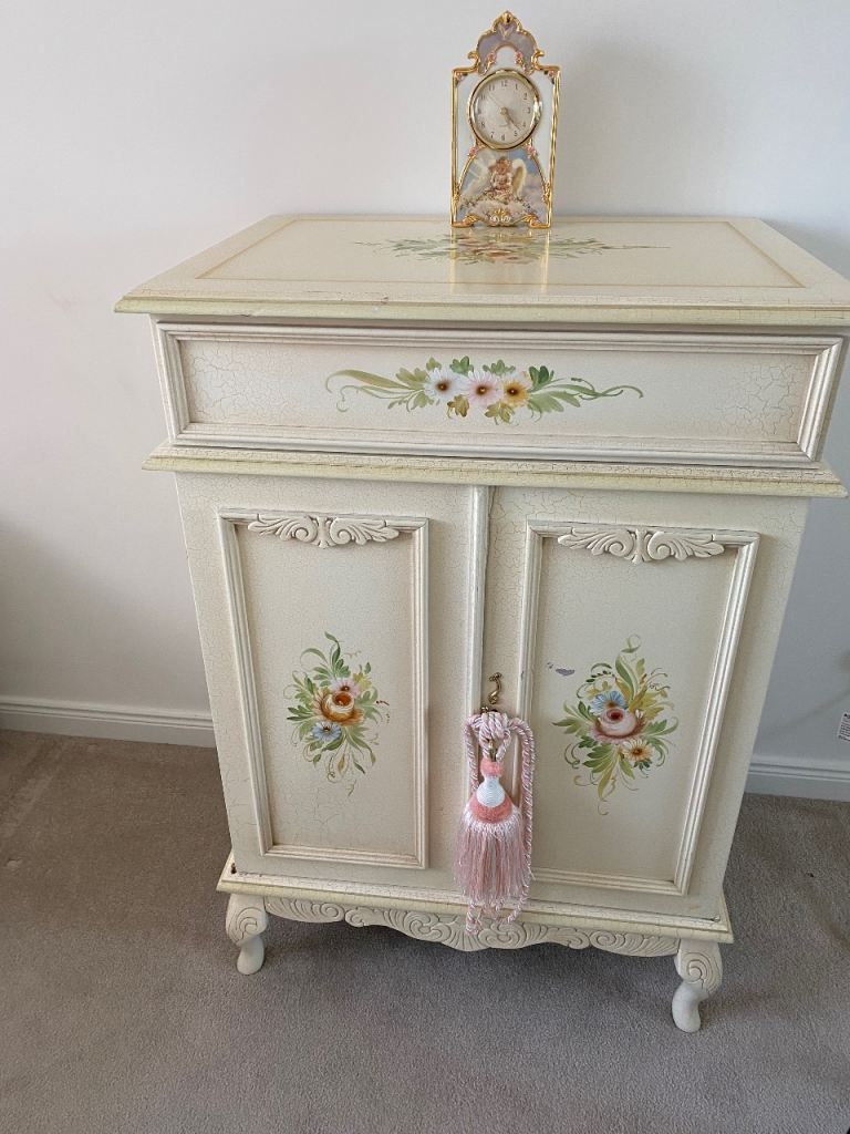 Vintage Cream Cabinet with Floral Detail – Good Condition