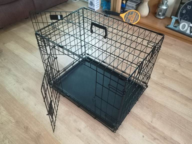 Dog Crate With Carrying Handle Has Front And Side Doors